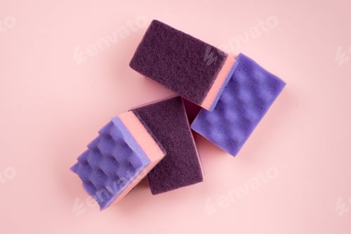 Preview: Kitchen sponges for washing dishes and other domestic needs on pink background