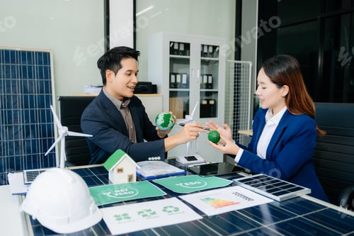 Preview: Business team people planning hand using laptop for working technology and business Net zero