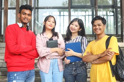 Preview: Portrait of group of happy students smiling on staircase or steps of college campus
