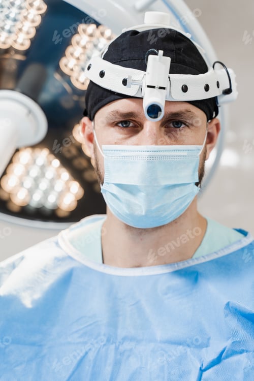 Preview: Male Doctor Wearing Surgical Mask in Hospital Setting