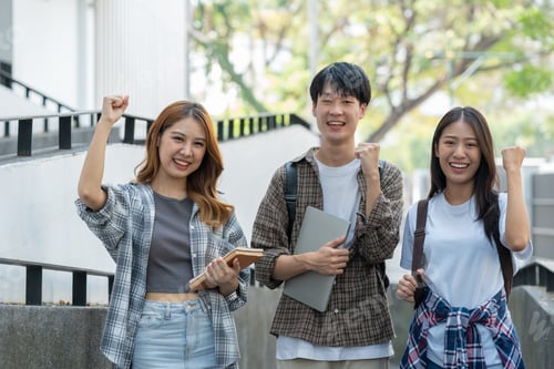 Preview: Asian students study and research together with computer notebooks and details in an outdoor biology