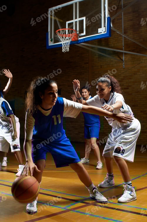 Preview: Basketball player defending opponent