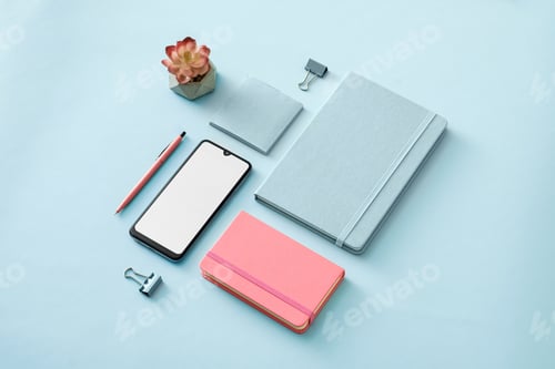 Preview: Neat color themed blue and pink office flt lay still life