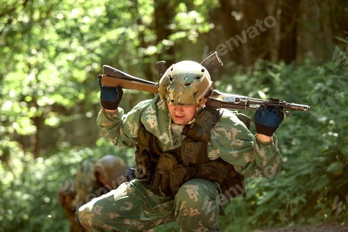 Preview: Full military experience - One day commando - running through the water with automatic rifle replica