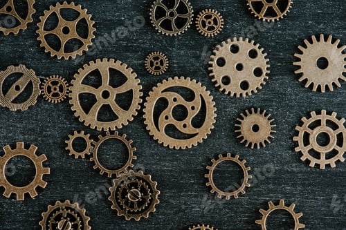 Preview: top view of vintage metal gears on dark wooden background