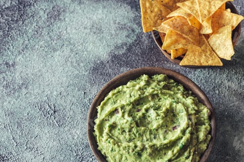Preview: Guacamole in bowl with tortilla chips