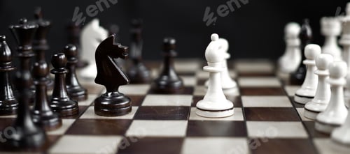 Preview: Chessboard and chess game. Competition between black and white, strategic intelligence board game.