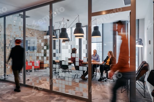 Preview: In the dynamic hustle and bustle of a business environment, a group of young business professionals