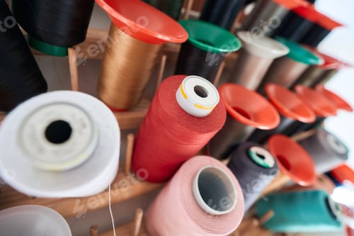 Preview: Stander with colourful spools in modern atelier