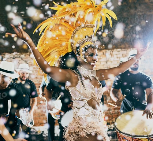 Preview: Cropped shot of a beautiful samba dancer performing in a carnival with her band