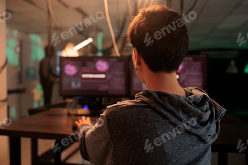 Preview: Female hacker using virus to break into computer system