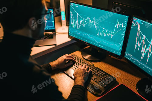 Preview: Trading expert analyzing current stock market trends at home office