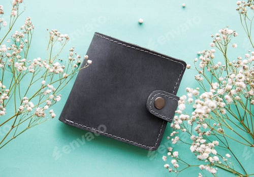Preview: Gray leather wallet on a light green background