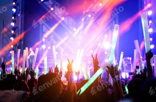 Preview: Crowd of concert stage lights and people fan audience silhouette raising hands or glow stick holding