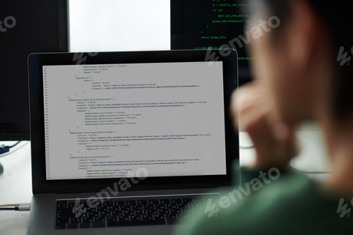 Preview: Devops Engineer Looking at Code