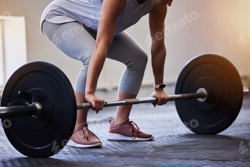 Preview: Woman bodybuilder, barbell deadlift and gym for wellness, fitness or exercise for strong body on fl