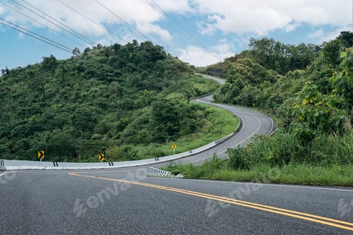 Preview: Winding road shaped like 3 on top of mountain in tropical rainforest at Nan province