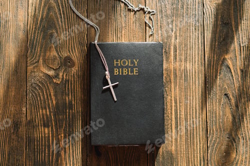 Preview: Bible and cross on a wood background. Study Bible worship concept.