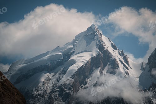 Preview: Mitre peak rising above clouds baltoro trek. Baltoro