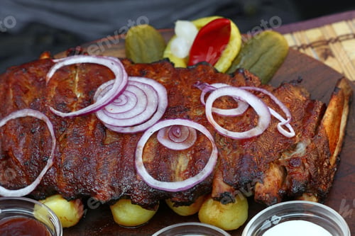 Preview: Rack of grill roasted pork spare ribs close up