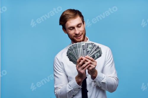 Preview: man with money in the hands of businessman emotions wealth
