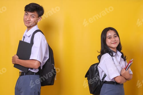 Preview: Happy Students Smiling and Holding Books