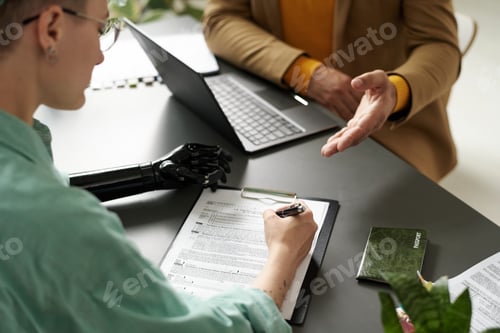 Preview: Woman with disability having consultation with insurance agent