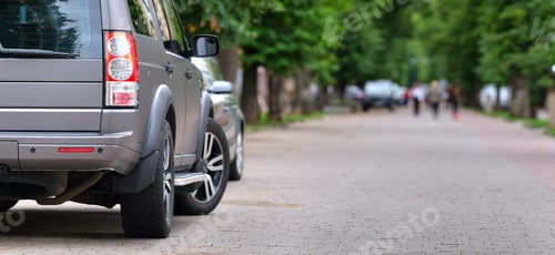 Preview: Close up of a car parked illegally against traffic rules on pedestrian city street side