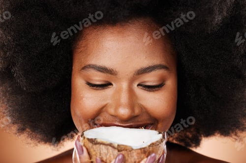 Preview: Closeup beauty, coconut and black woman in studio with skincare, healthy glow and smile on face. Af