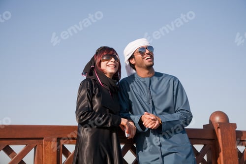 Preview: Middle Eastern people and fence, outdoors