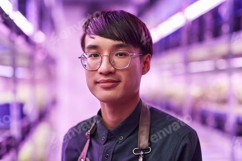 Preview: Asian young man in the plant