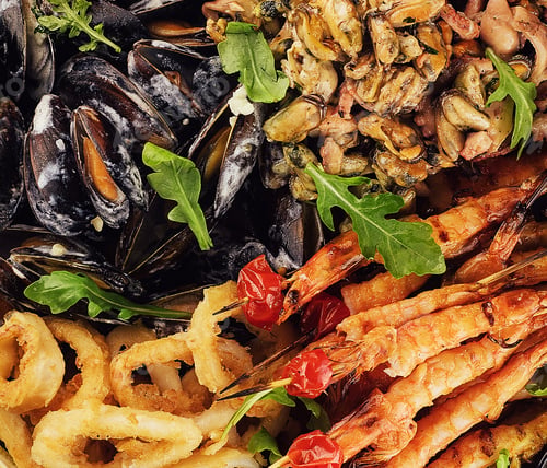 Preview: Delicious array of assorted seafood, including prawns, mussels, and calamari