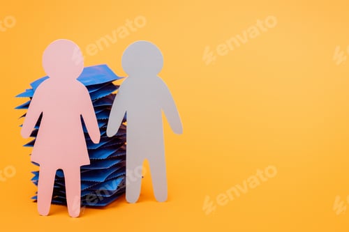 Preview: stack of condoms near paper people on orange