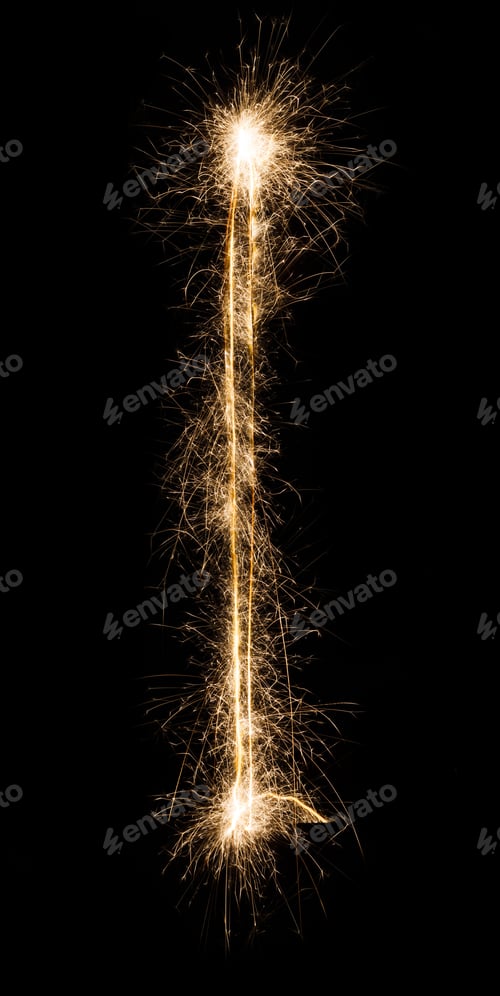 Preview: English Letter I or line from sparklers on black background.