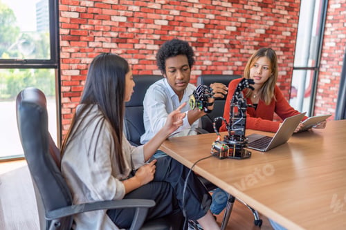 Preview: Teenager children learning with new innovation robotic hand interface hand control in classroom