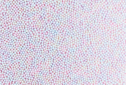 Preview: Pastel multicolored polyfoam balls background.