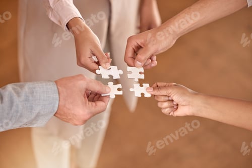 Preview: Business people, hands and puzzle piece in planning, teamwork or brainstorming for collaboration at