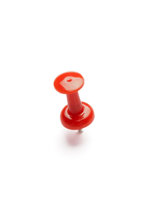Preview: close up of a pushpin on white background