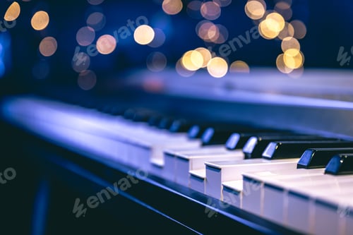 Preview: Piano keys close-up on a blurred background with bokeh.