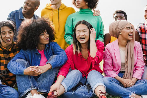 Preview: Group young multiracial people having fun together at city park - Diverse friends enjoy day outdoor