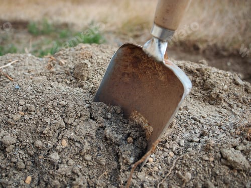 Preview: Shovel stuck in the soil