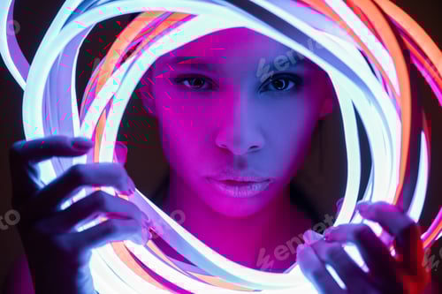 Preview: portrait of futuristic african american woman in neon lighting