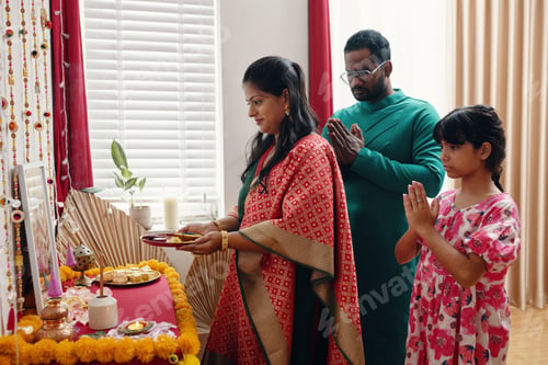 Preview: Family Participating in Cultural Ritual Ceremony Indoors