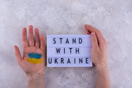 Preview: Stop war in Ukraine concept with flag colors