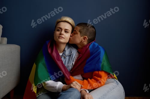 Preview: Young lesbian woman kissing girlfriend showing love, lgbt relationship