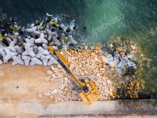 Preview: Rows of Concrete Blocks Along Beach