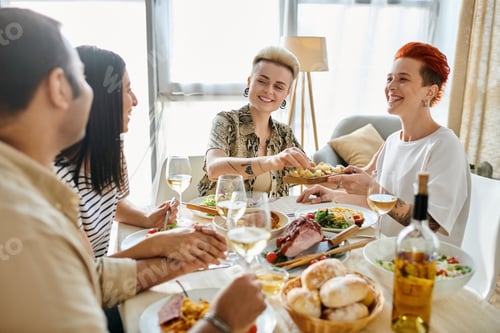 Preview: A Festive Gathering of Friends Sharing a Meal