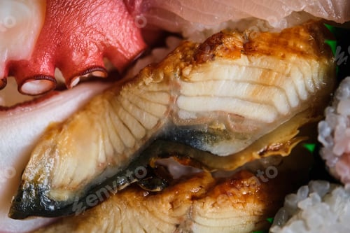 Preview: Eel nigiri on a selection of varied Japanese sushi.