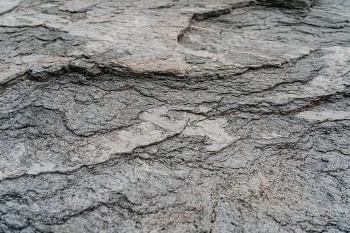 Preview: Gray rock natural surface used as background texture and wallpaper.