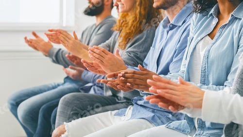 Preview: Diverse people applauding after successful workshop training or seminar
